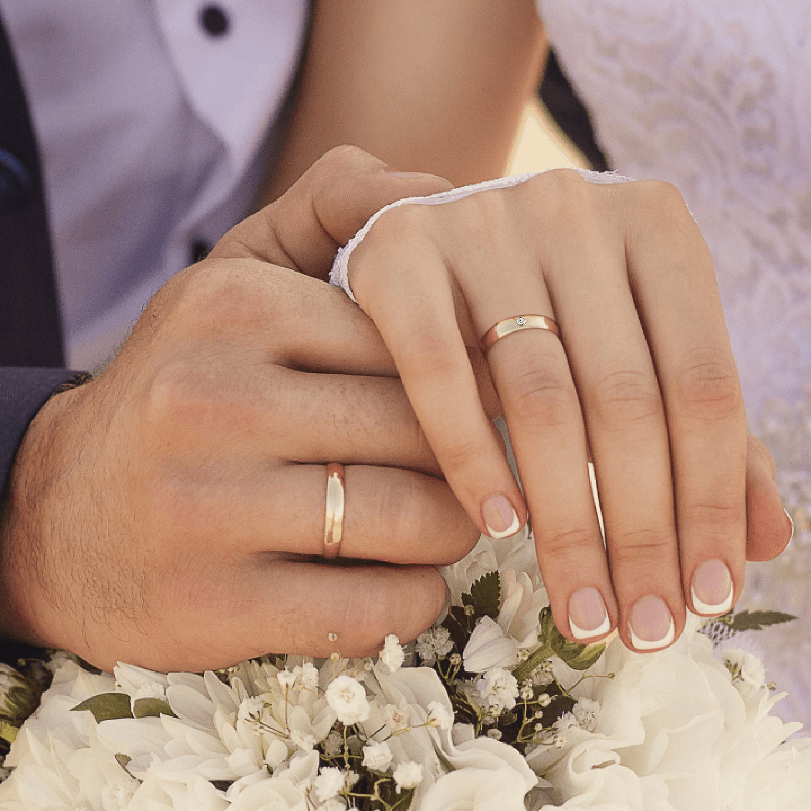 Couple-wearing-wedding-rings.jpg